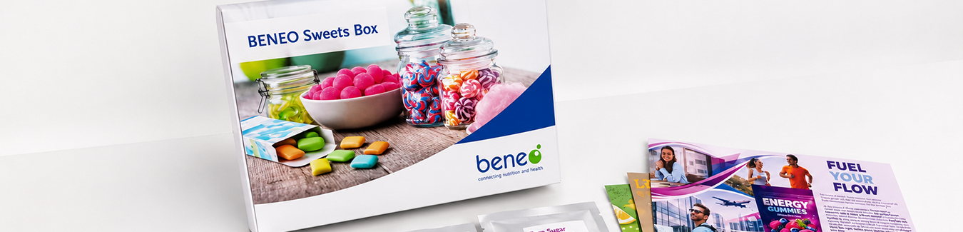 BENEO Sweets Box mit Süßwarenproben, Prototypen für funktionelle Süßigkeiten und Produktinformationsmaterialien zu zuckerreduzierten sowie mit Energie und Ballaststoffen angereicherten Süßwarenkonzepten.