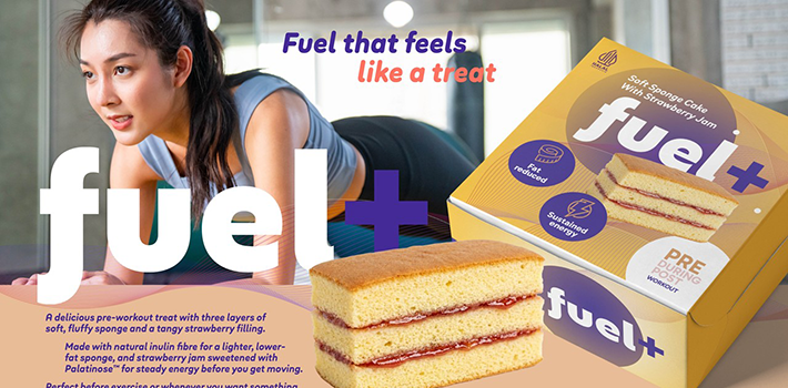 Active woman exercising alongside Fuel+ strawberry snack cakes formulated with sustained energy and fibre, designed as a lighter pre-workout indulgence.