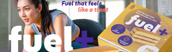Active woman exercising alongside a reduced-fat snack cake product that promotes sustained energy and healthier indulgence.